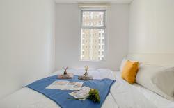 Basic Minimalist 1BR Vittoria Residence ByTravelio