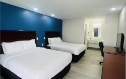 The Hallmark Inn & Suites Newly Renovated Rooms 
