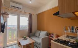 Cozy 2BR Apartment Green Pramuka City By Travelio
