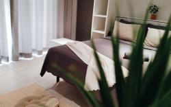 Cozy Queen Studio with Balcony by ComfyAsia