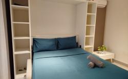 Simple Queen Studio with Balcony by ComfyAsia