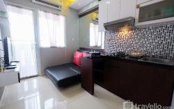 Homey 2BR Green Pramuka Apartment By Travelio