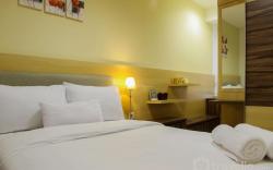 Modern 1BR @ Cinere Bellevue Apartment By Travelio