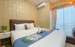 Cozy Studio Apt @ Grand Kamala Lagoon By Travelio