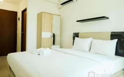 Studio near Mall at Tifolia Apartment By Travelio
