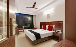 Capital O Elegant Amethyst Business Hotel Near Ragigudda Sri Prasanna Anjaneyaswamy Temple