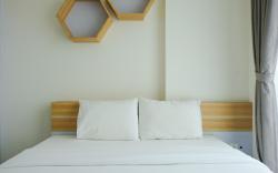Compact 1BR at Tree Park Apartment By Travelio