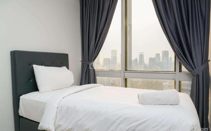 Stunning 2BR at The Masterpiece Apt By Travelio