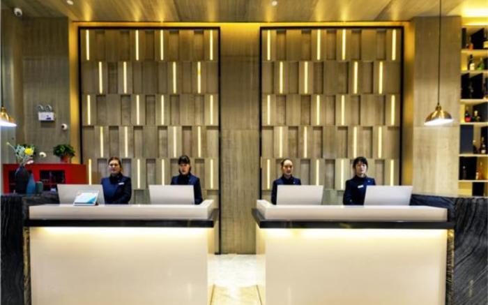 Echarm Hotel Yingshang High-speed Railway Station Wuzhou Wanhui Plaza
