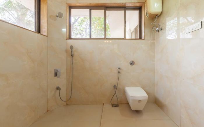 StayVista's Santoni Farms - Riverside Bliss with Pool, Orchard & Activities