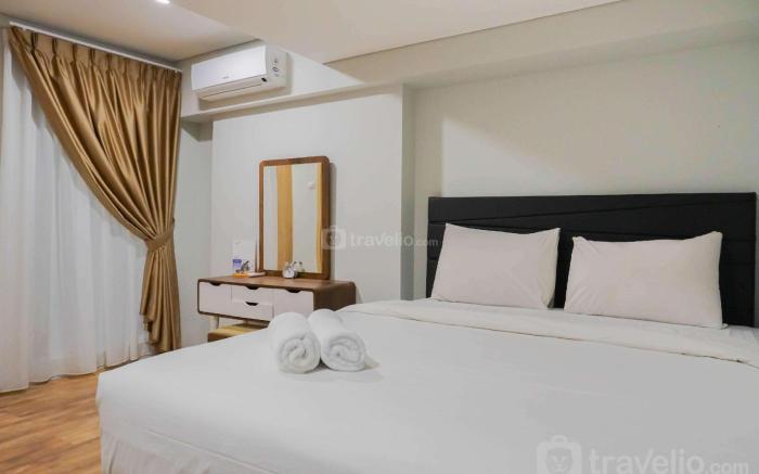 Modern 2BR Apartment Maqna Residence By Travelio