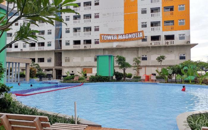Cozy Studio Green Pramuka Apartment By Travelio