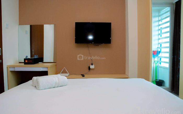 Minimalist 1BR Grand Kamala Lagoon Apt By Travelio