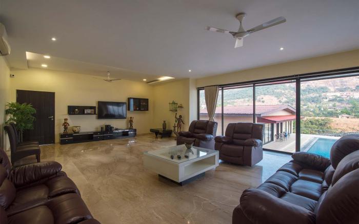 StayVista's Lake Mansion - Lakeside Villa with Mountain View, Large Pool & Sprawling Lawn