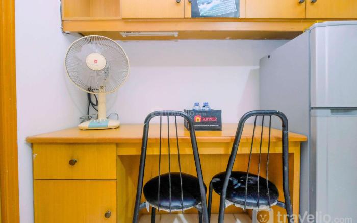 New Furnished 1BR Rajawali Apartment By Travelio