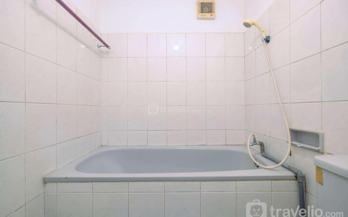 New Furnished 1BR Rajawali Apartment By Travelio