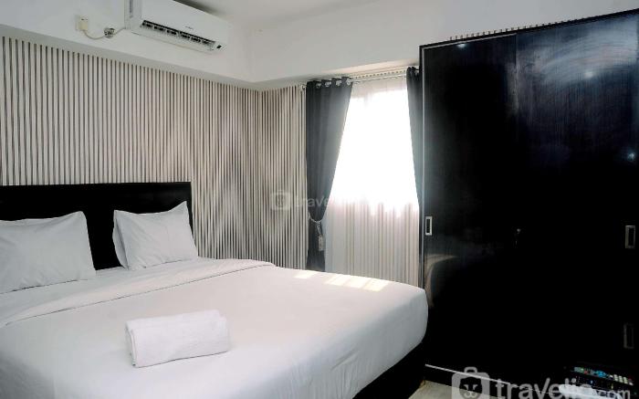 Homey and Relaxing 2BR The Wave Apt By Travelio