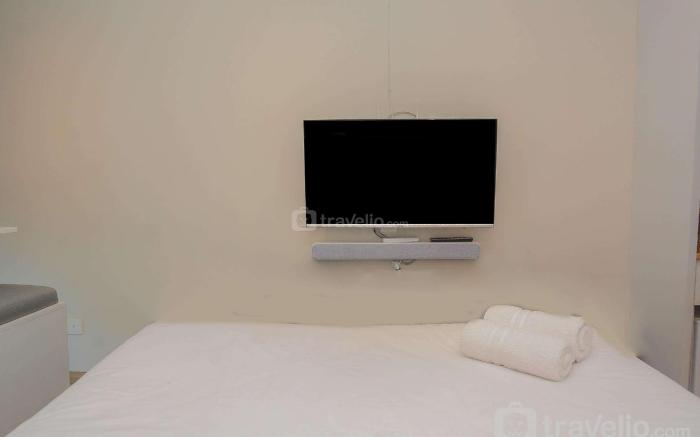 Best Studio with Wall Bed Tifolia Apt By Travelio