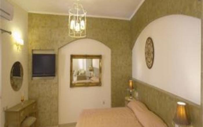 Casa Moazzo Suites and Apartments
