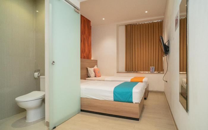Sans Hotel Kupang Indah Surabaya by RedDoorz