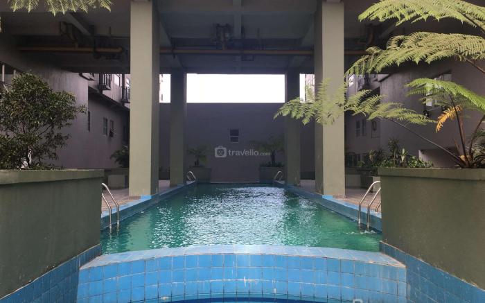 Comfy 2BR Grand Asia Afrika Apartment By Travelio