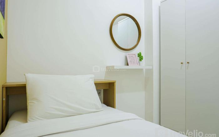 Relaxing 2BR at Bassura City Apartment By Travelio