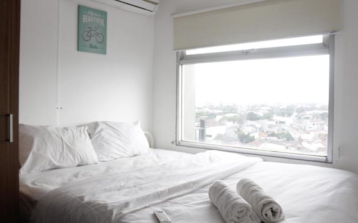 Comfy 2BR Apartment Grand Asia Afrika By Travelio