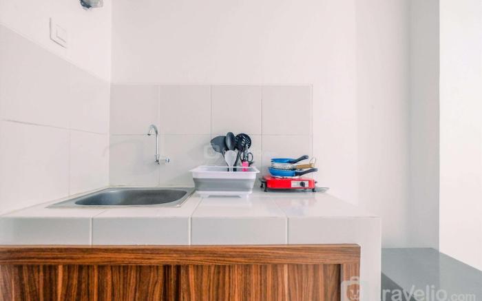Beautiful Studio at Gunung Putri Apt By Travelio