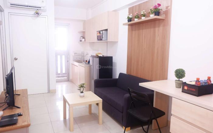 Cozy 2BR Baywalk Green Bay Apartment By Travelio