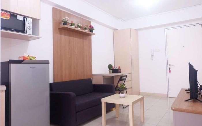 Cozy 2BR Baywalk Green Bay Apartment By Travelio