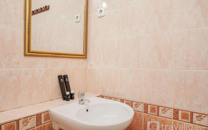 Fully Furnished with Comfortable 2BR Grand Palace Kemayoran Apartment By Travelio