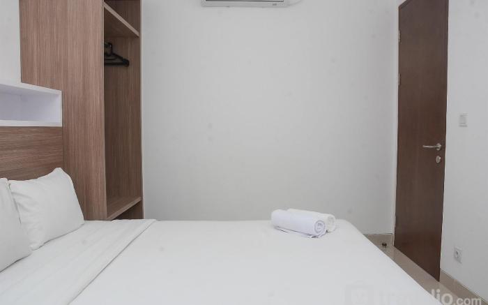 Modern 1BR at Ciputra World 2 Apartment By Travelio