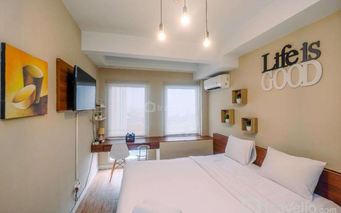 Modern and Compact Studio at Patraland Urbano Apartment By Travelio