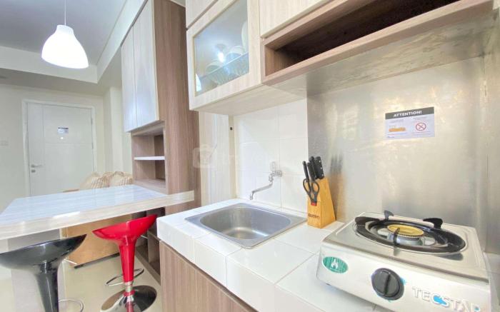 Private & Bright 2BR Apartment at Parahyangan Residence near Nara Park By Travelio