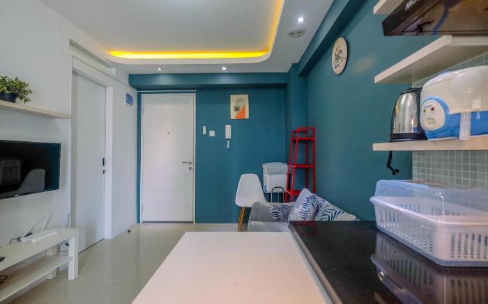 Clean and Simply Cozy 2BR Bassura City Apartment By Travelio