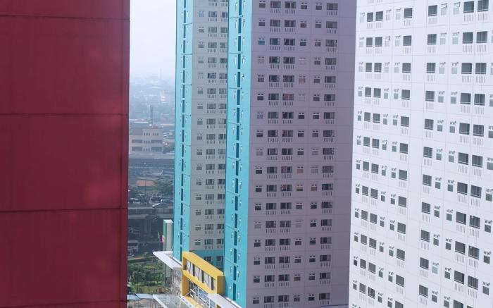 Apartment 2BR at Green Pramuka City By Travelio