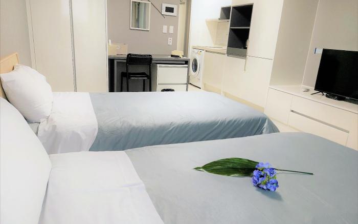 Arapalace No602(2bed)-공항인근,오션시티뷰,동문시장 10분,취사/세탁가능