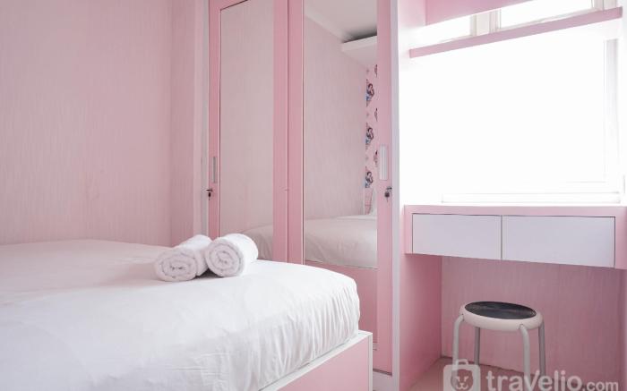 Homey and Fresh 2BR Green Pramuka Apt By Travelio