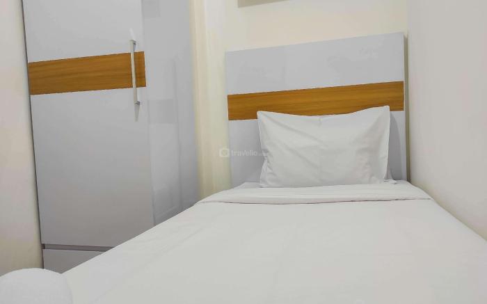 Homey and Comfy 2BR at Vida View Apt By Travelio