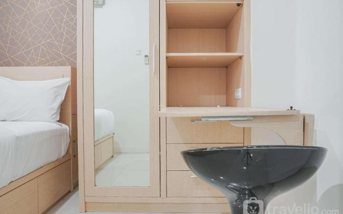 Cozy Stay at 2BR Green Pramuka City By Travelio