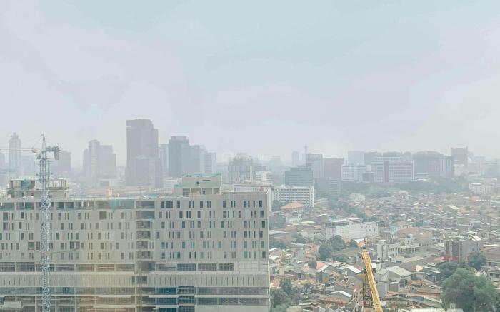 Minimalist Studio Room at Menteng Park By Travelio