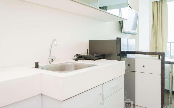 Homey Studio Room Tree Park City BSD By Travelio