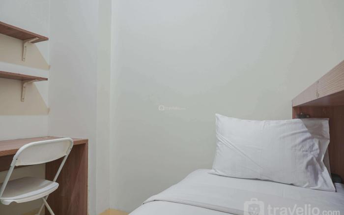 Cozy Living 2BR Green Pramuka City Apt By Travelio