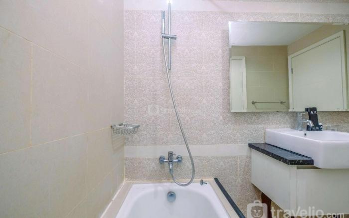 Minimalist 1BR Apartment @ Casa Grande By Travelio