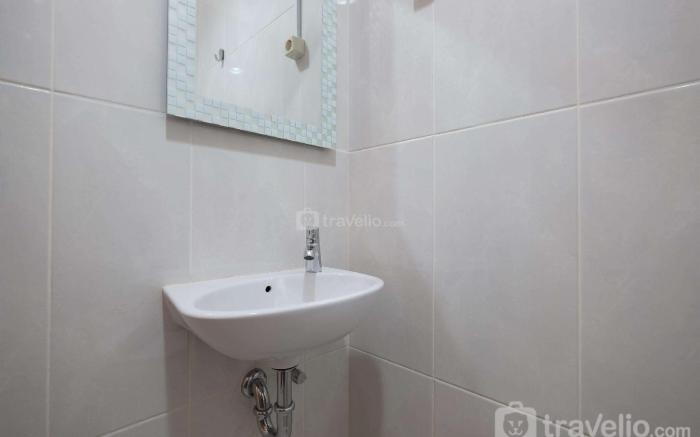 Comfort 1BR at Evenciio Margonda By Travelio