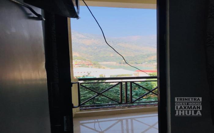 OYO HOME 84603 Trinetra Guest House