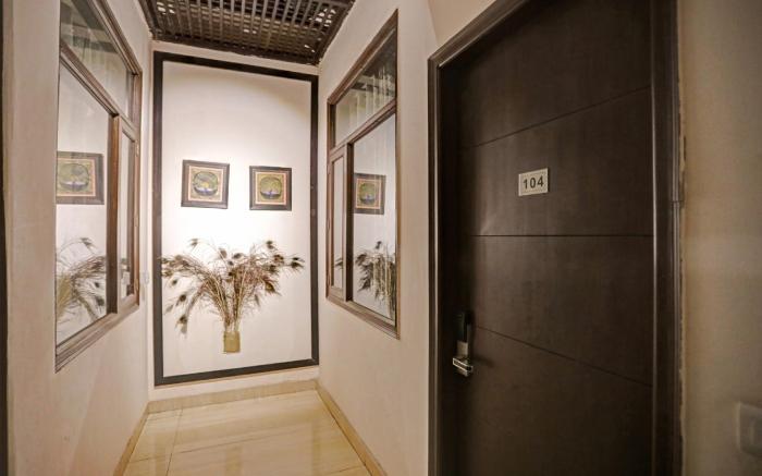 Capital O Qotel Suites Hotel