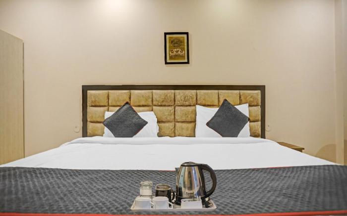 Capital O Qotel Suites Hotel