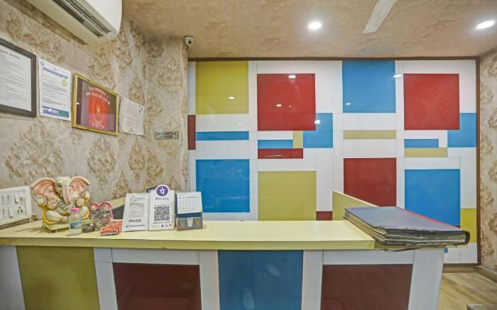 Capital O Qotel Suites Hotel