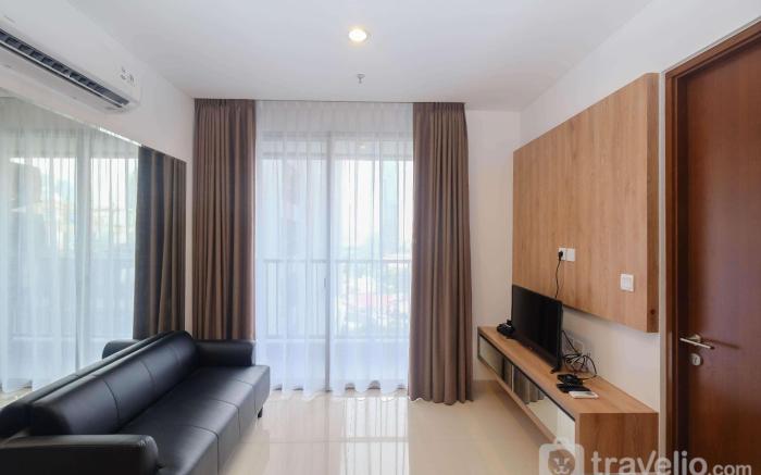 Homey 1BR at Ciputra World 2 Apartment By Travelio